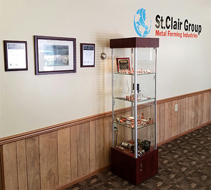MFI lobby with ISO certifications and customer award